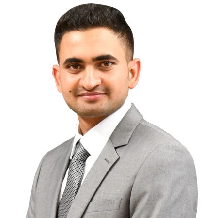Amit Sharma | CAQA LLND A man in a suit and tie, Amit Sharma is an LLND consultant at CAQA LLND.