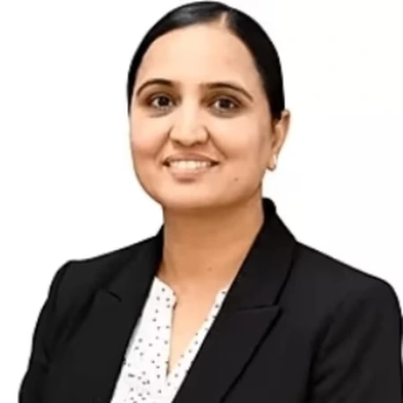 Mandeep Chahil | CAQA LLND Mandeep Chahil is a CAQA LLND consultant smiling in professional business attire.