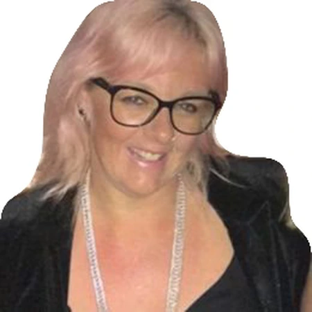 Nicole Talarico | CAQA LLND A smiling Nicole Talarico, a CAQA LLND consultant, wears glasses and a lanyard.
