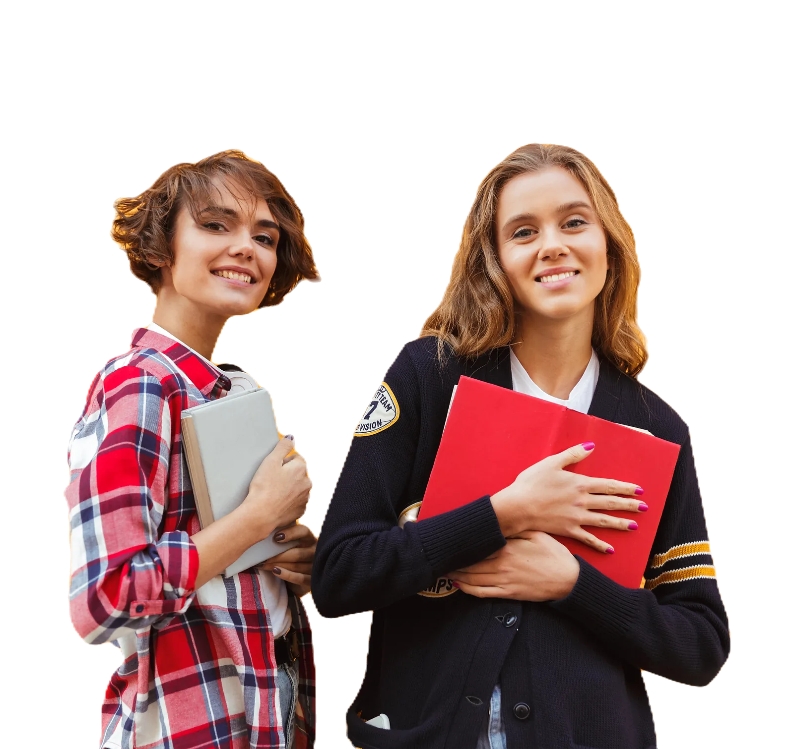 Teenage Students | CAQA LLND Two smiling teenage students hold books while learning foundational skills.